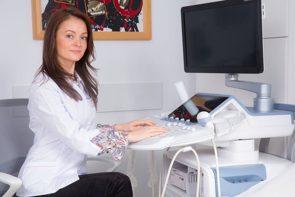 Dr. LUIZA MARIA GUZGĂ